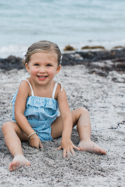 Summery matching sibling photos on the beach