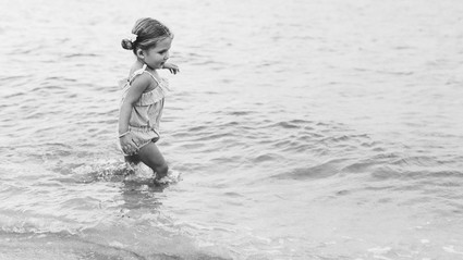 Summery matching sibling photos on the beach