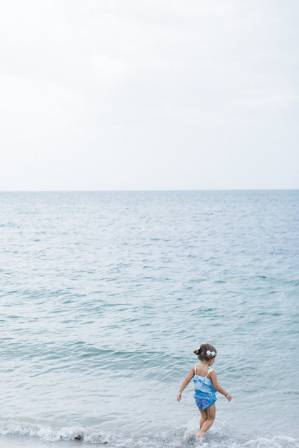 Summery matching sibling photos on the beach
