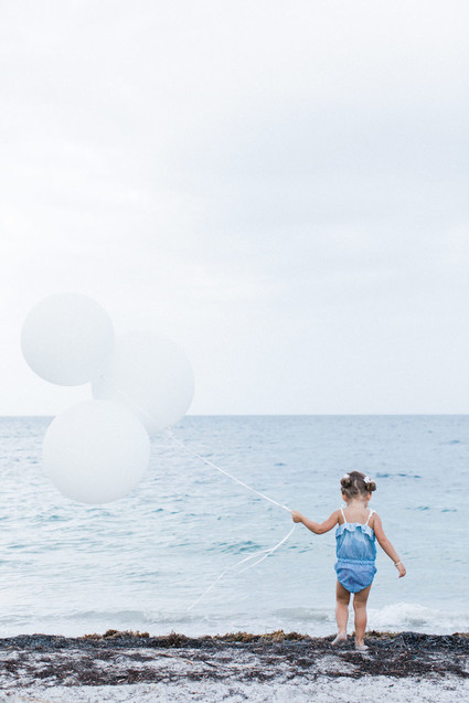 Summery matching sibling photos on the beach