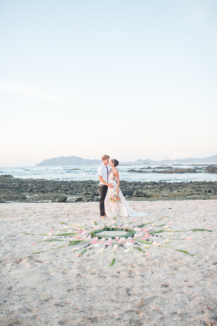 floral mandala on the beach