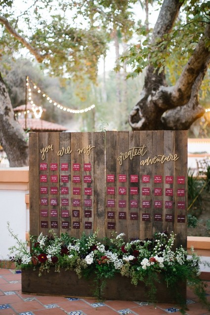 Wood place card display with burgundy place cards