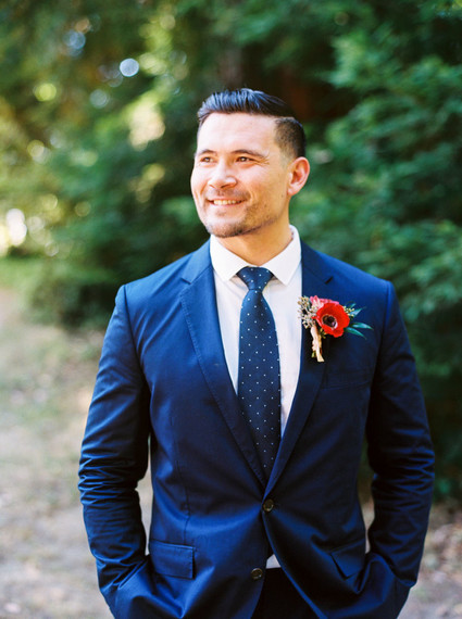 groom in blue suit