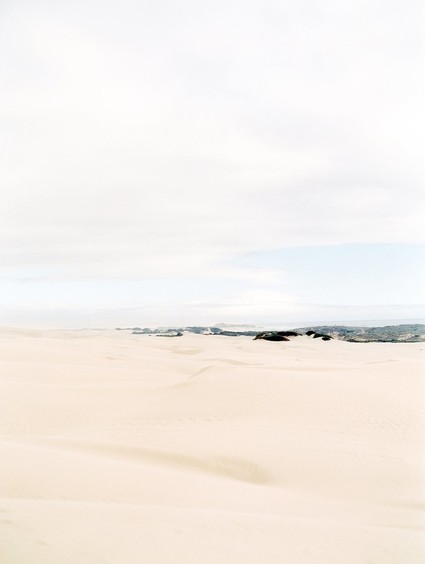 Pastel sand dune engagement photos