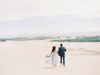 Pastel sand dune engagement photos