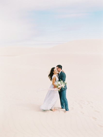 Pastel sand dune engagement photos
