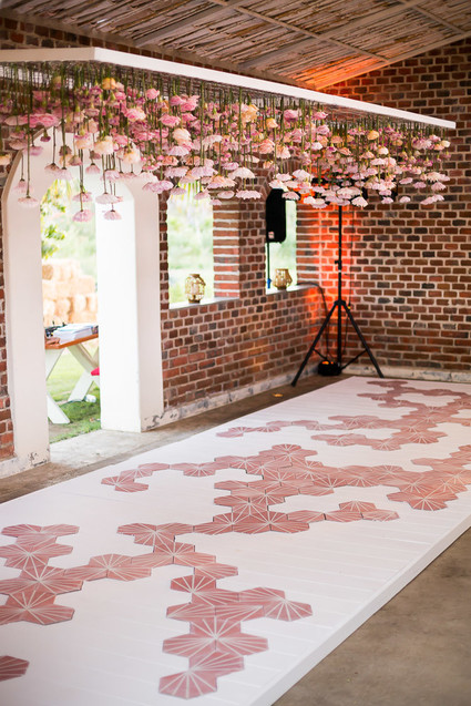 hanging flowers above dance floor