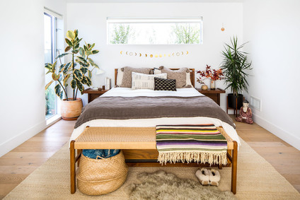 Cozy master bedroom for fall with Coyuchi on 100 Layer Cake