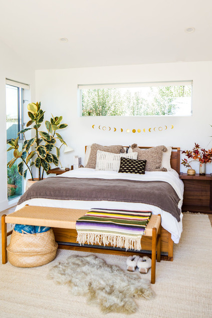 Cozy master bedroom for fall with Coyuchi on 100 Layer Cake