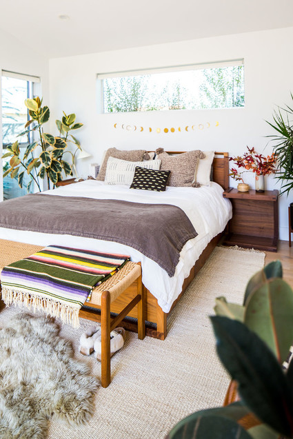 Cozy master bedroom for fall with Coyuchi on 100 Layer Cake