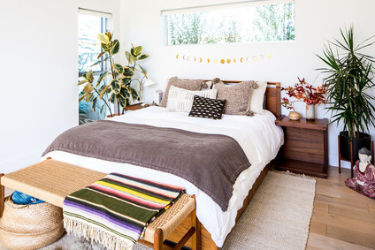 Cozy master bedroom for fall with Coyuchi on 100 Layer Cake