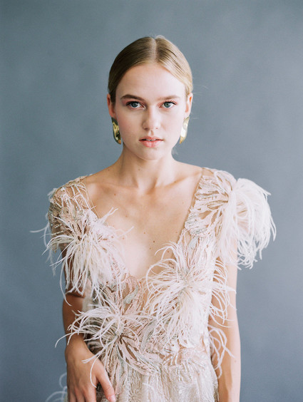 white feather wedding dress