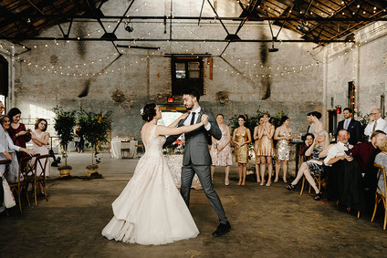 Romantic, industrial, floral wedding at Basilica Hudson in the Hudson Valley