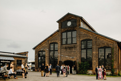 Romantic, industrial, floral wedding at Basilica Hudson in the Hudson Valley