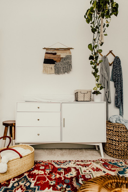 Gender neutral gold and emerald boho nursery