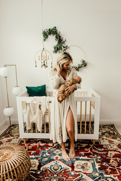 Gender neutral gold and emerald boho nursery
