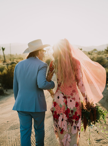 Rustic Joshua Tree wedding with a pink floral dress