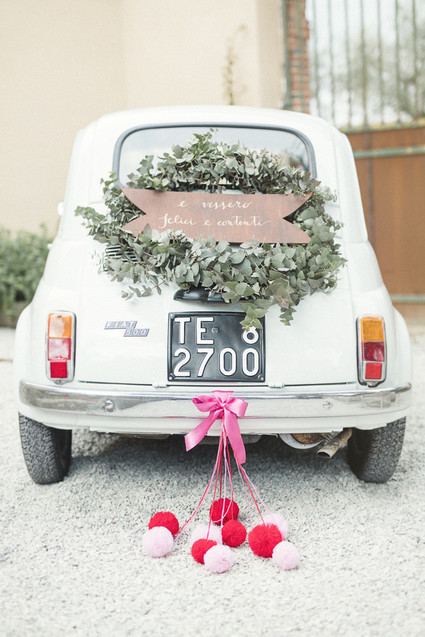 Vintage fiat wedding getaway car