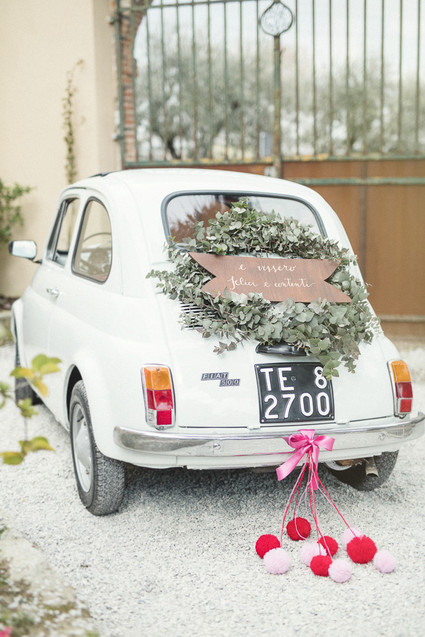 Vintage fiat wedding getaway car