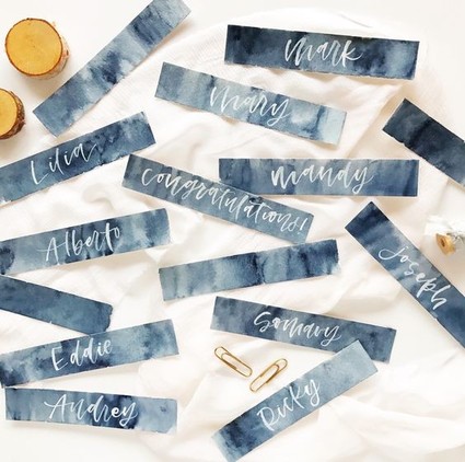 Calligraphy and watercolor escort cards