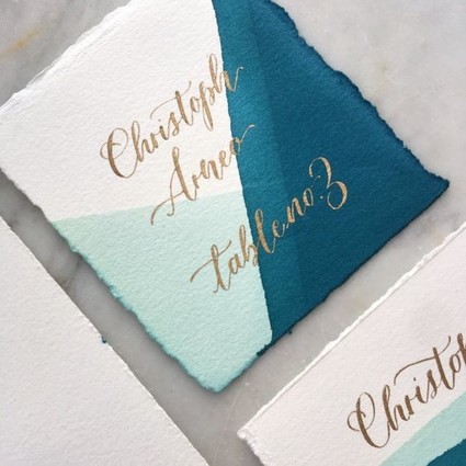 Calligraphy and watercolor escort cards