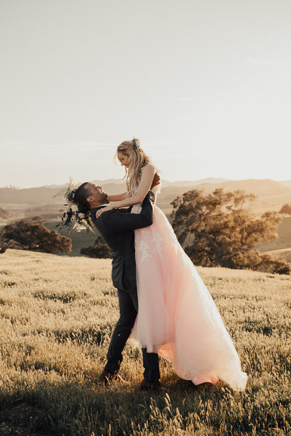 Rustic California wedding with a pink dress