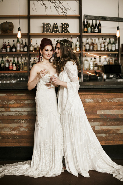 Romantic urban same sex wedding ideas with blush tones