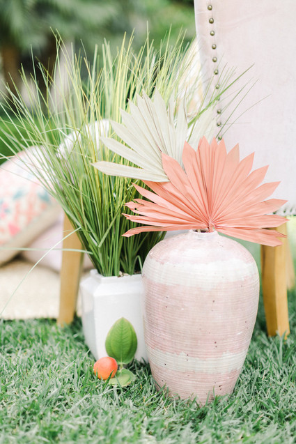 Colorful modern wedding with a killer tropical floral installation