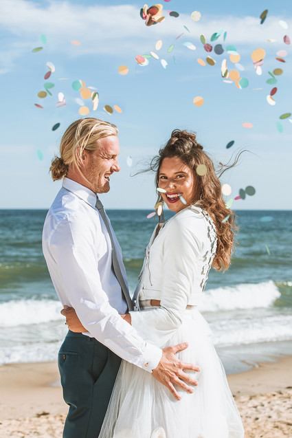 Surf inspired beach wedding in Montauk with the world's cutest dress