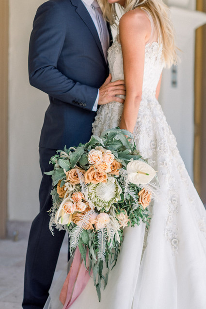 An all pink Palm Springs wedding (and venue!) with copper and pampas grass
