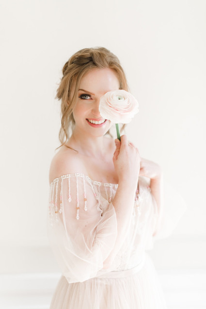 A stunning bridal editorial with a giant pink camellia tree