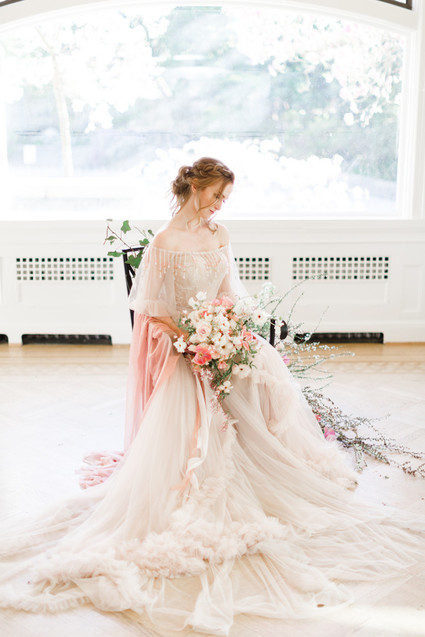 A stunning bridal editorial with a giant pink camellia tree