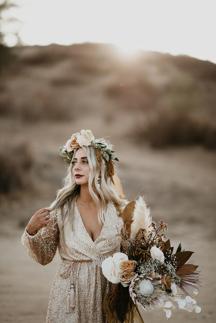 Boho vow renewal with a palm frond teepee at Wolf Feather Honey Farm