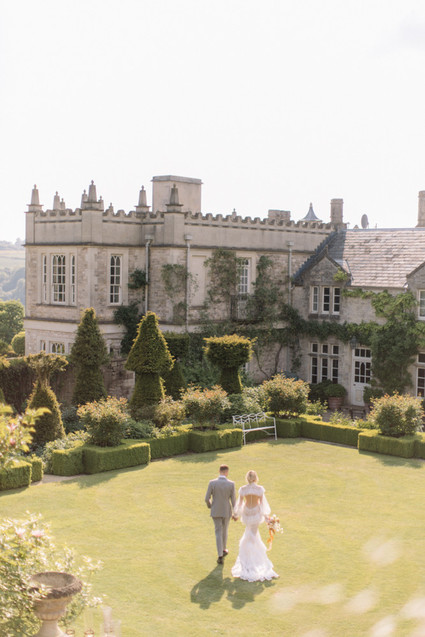 Modern stylish fairytale wedding in a dramatic English garden