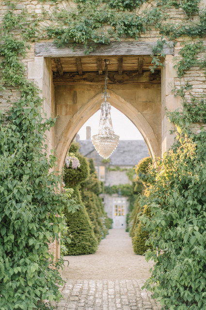 Modern stylish fairytale wedding in a dramatic English garden