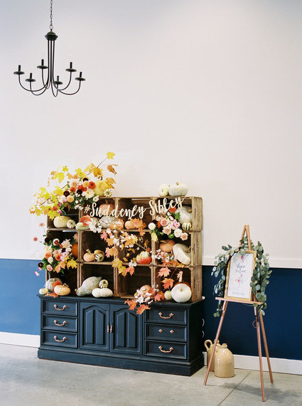fall wedding decor with pumpkins