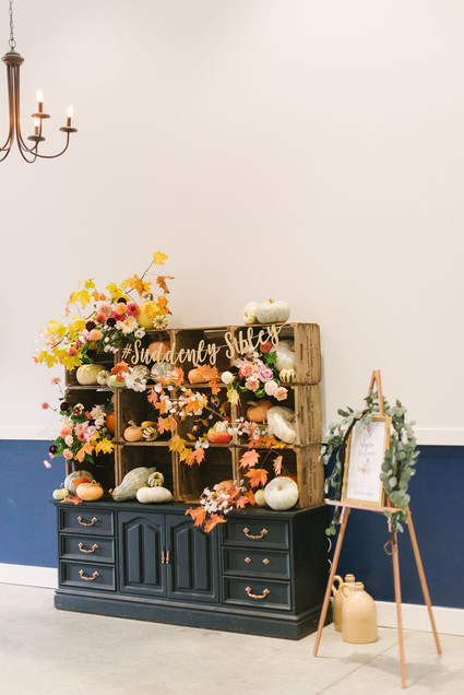 fall wedding decor with pumpkins