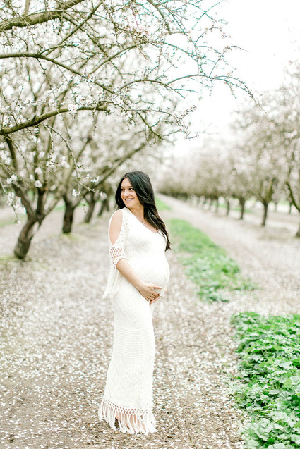 Almond orchard maternity photos in the central valley of California