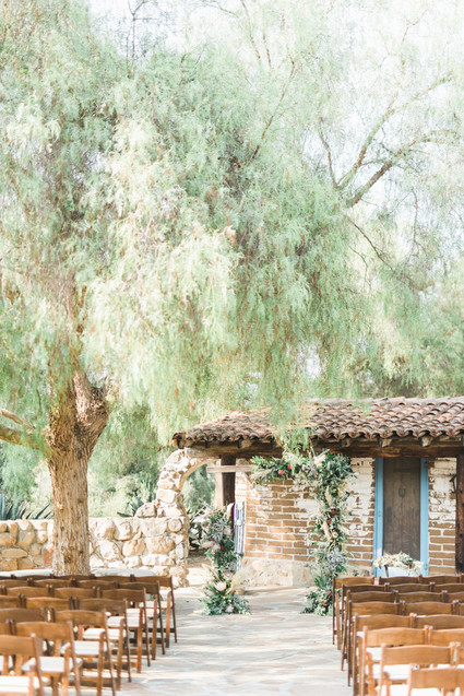 An all white Mexican inspires wedding at the most romantic Spanish venue in San Diego
