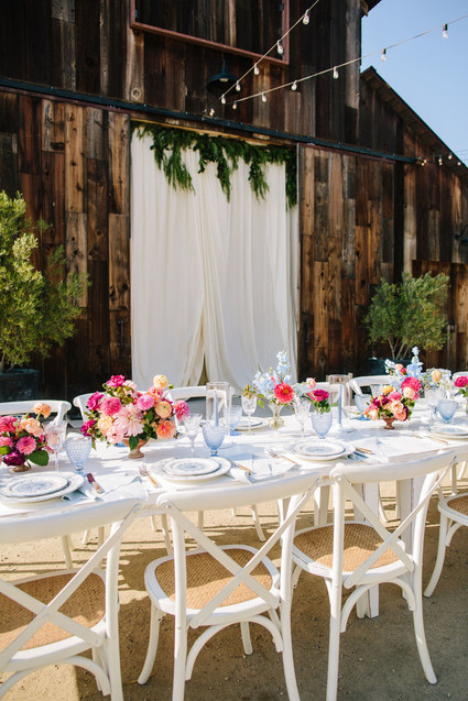 long white and floral reception tables at Greengate Ranch