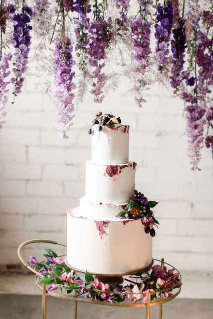 Bright moody spring wedding inspo with a dramatic floral curtain