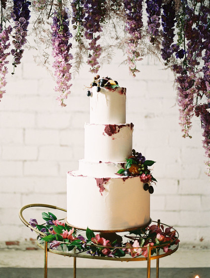 Bright moody spring wedding inspo with a dramatic floral curtain