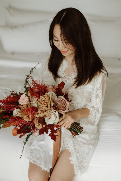 Tropical fall wedding in Thailand with rust and peachy accents