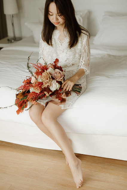 Tropical fall wedding in Thailand with rust and peachy accents