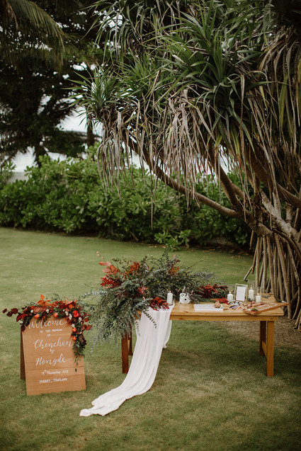 Tropical fall wedding in Thailand with rust and peachy accents