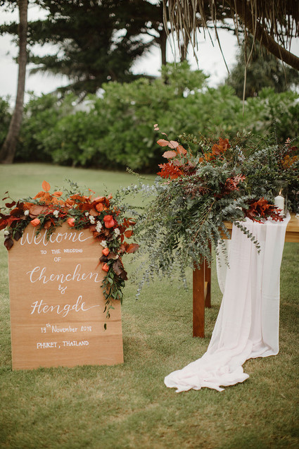 Tropical fall wedding in Thailand with rust and peachy accents