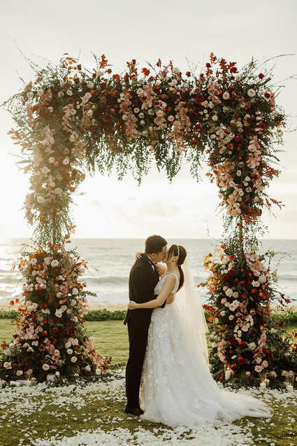 Tropical fall wedding in Thailand with rust and peachy accents