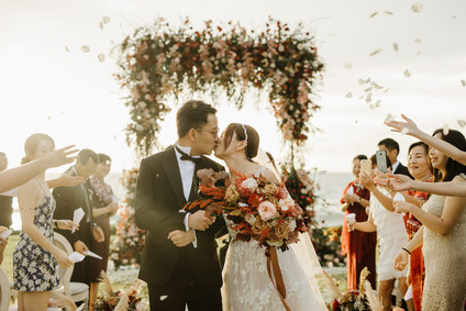 Tropical fall wedding in Thailand with rust and peachy accents