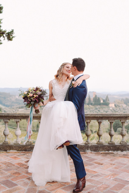 Romantic destination wedding at a pink Tuscan villa
