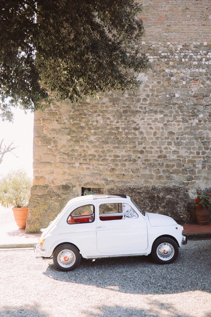 Romantic destination wedding at a pink Tuscan villa